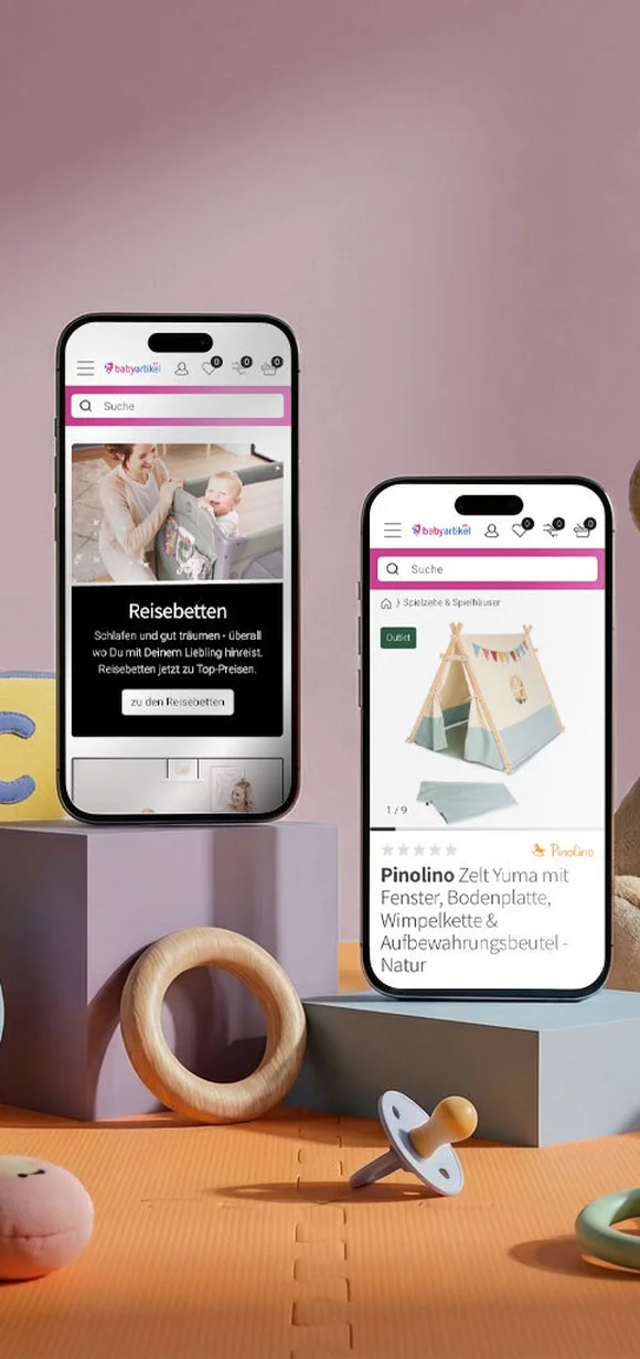 Babyartikel.de E-Commerce-Website-Vorschau auf zwei Mobilgeräten mit Reisebetten und dem Pinolino Spielzelt Yuma inmitten von Babyspielzeug und Zubehör