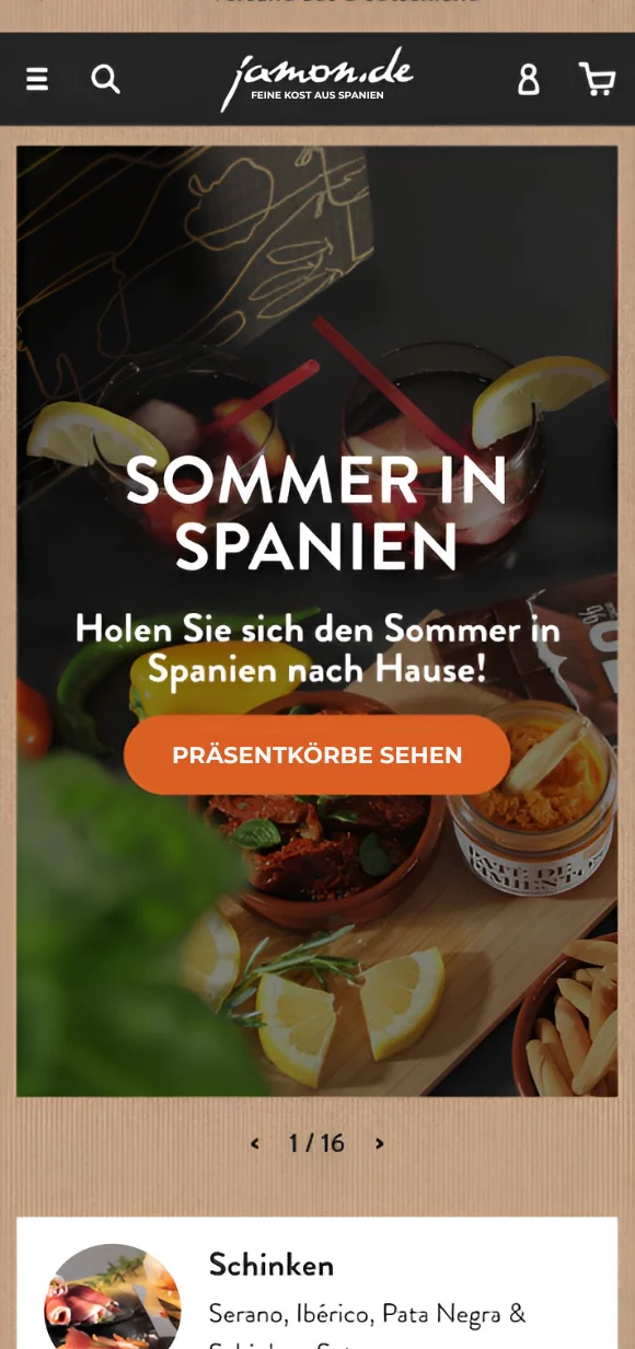 Mobile Jamon.de E-Commerce-Oberfläche auf einem Smartphone mit spanischen Feinkostspezialitäten, einer Sommer-Aktion für Präsentkörbe und einer Vorschau auf die Schinken-Kategorie